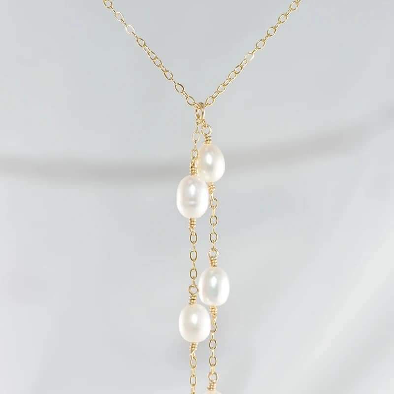 14K gold-filled Y necklace featuring a natural pearl pendant, perfect for boho-inspired style.